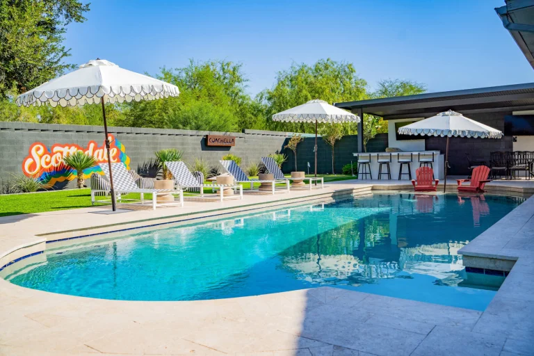 The Oasis vacation home in Scottsdale with palm trees and heated pool